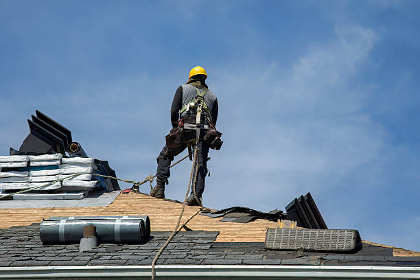 Professional Flat Roof Repair technician working in Wellsville, KS